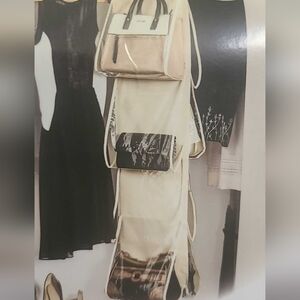 Purse organizer, holds 8 handbags with clear pockets & swivel neck hanger